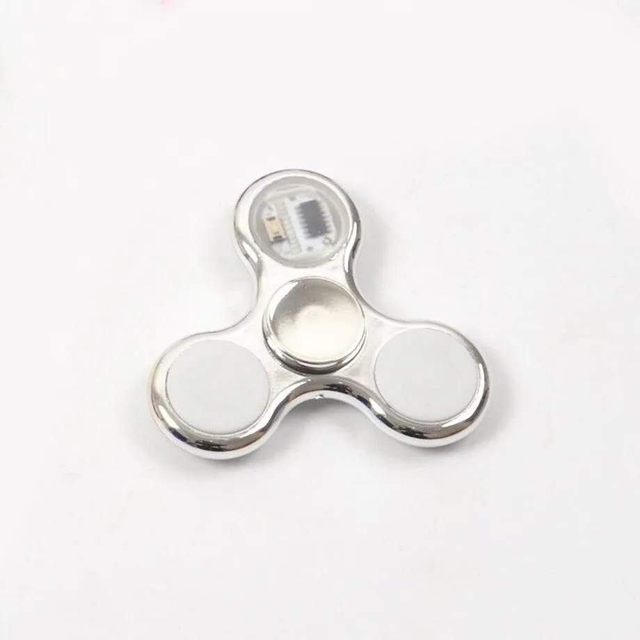 Svíticí fidget spinner E46