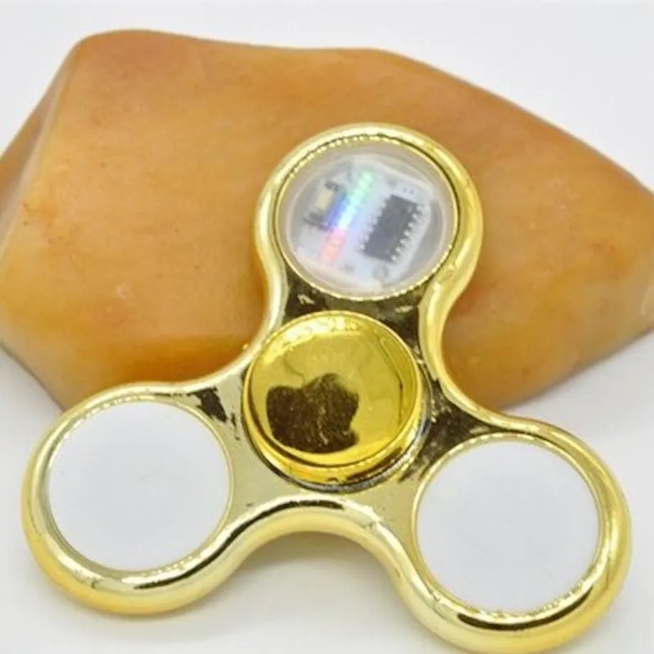 Svíticí fidget spinner Tyisha